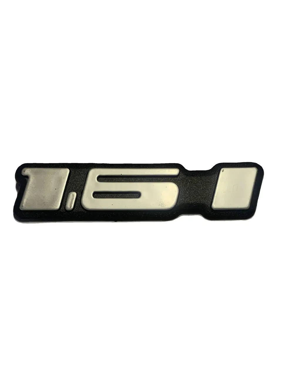 Эмблема "1,6" багажника